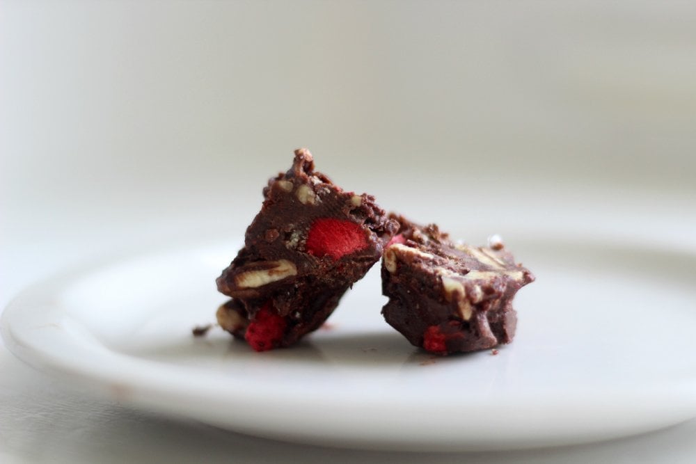 chocolate covered strawberry paleo mounds cut in half