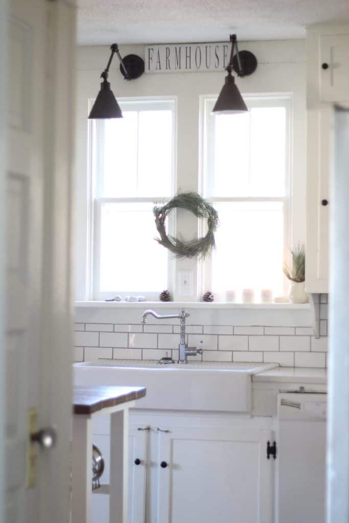 farmhouse sign above kitchen sink