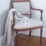 Learn how to reupholster a chair with a staple gun and hot glue. No sewing required.