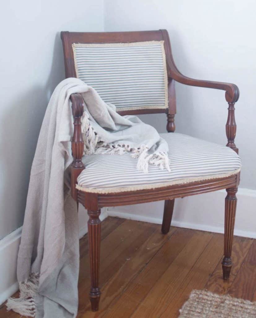 Antique wood chair reupholstered with blue and white ticking stripe - how to reupholster a chair