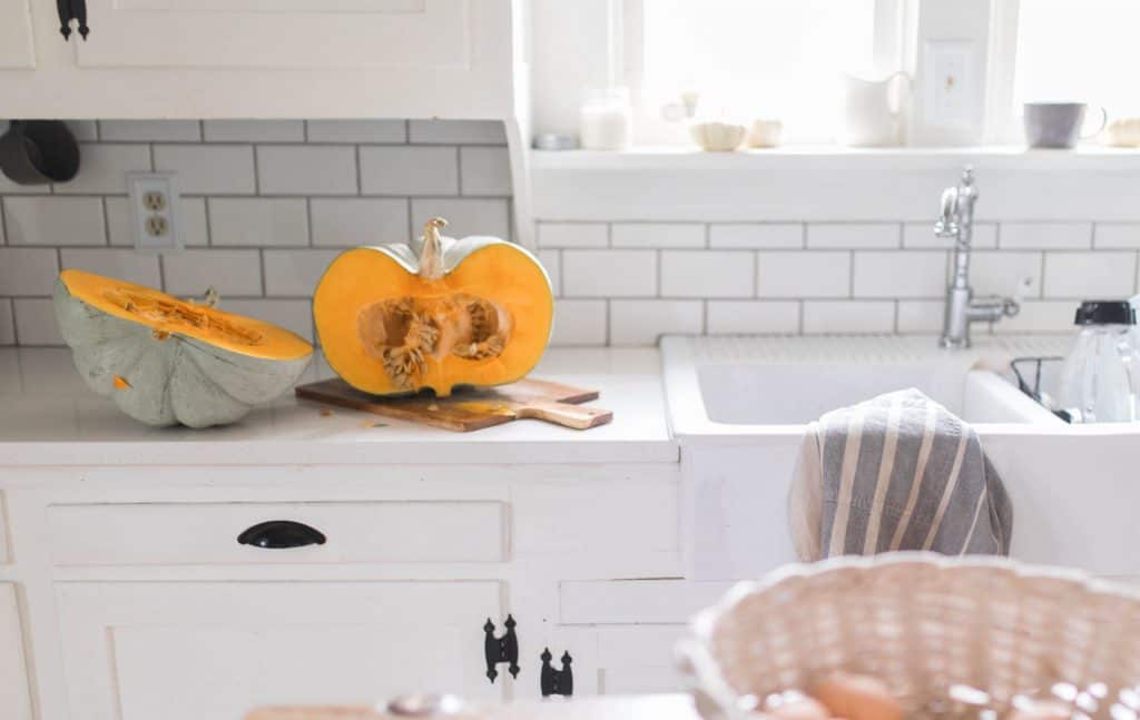 sliced pumpkin in half -how to cook a pumpkin video tutorial - best pumpkins for baking