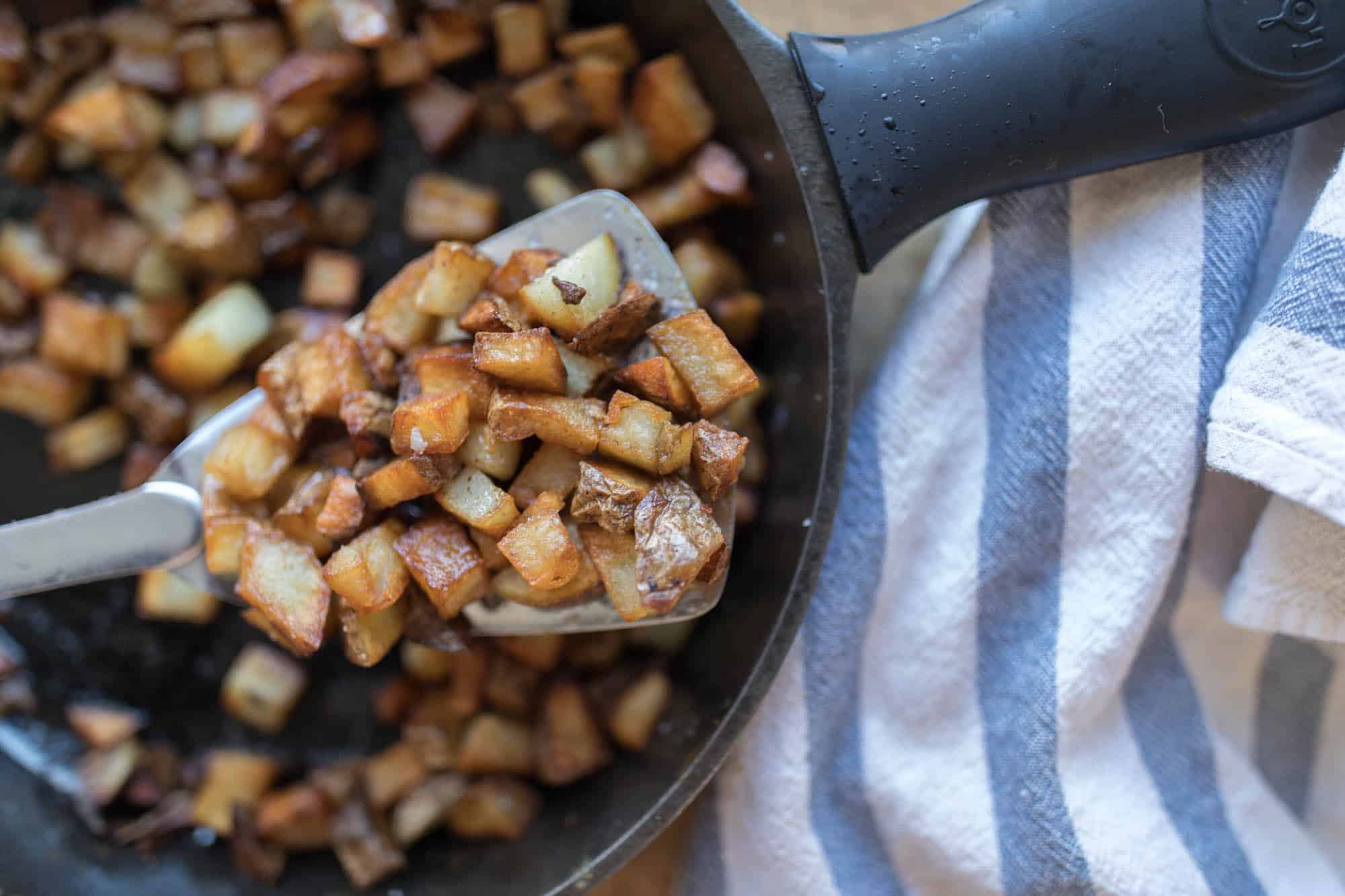 Cast Iron Skillet Potatoes - Biscuits & Burlap