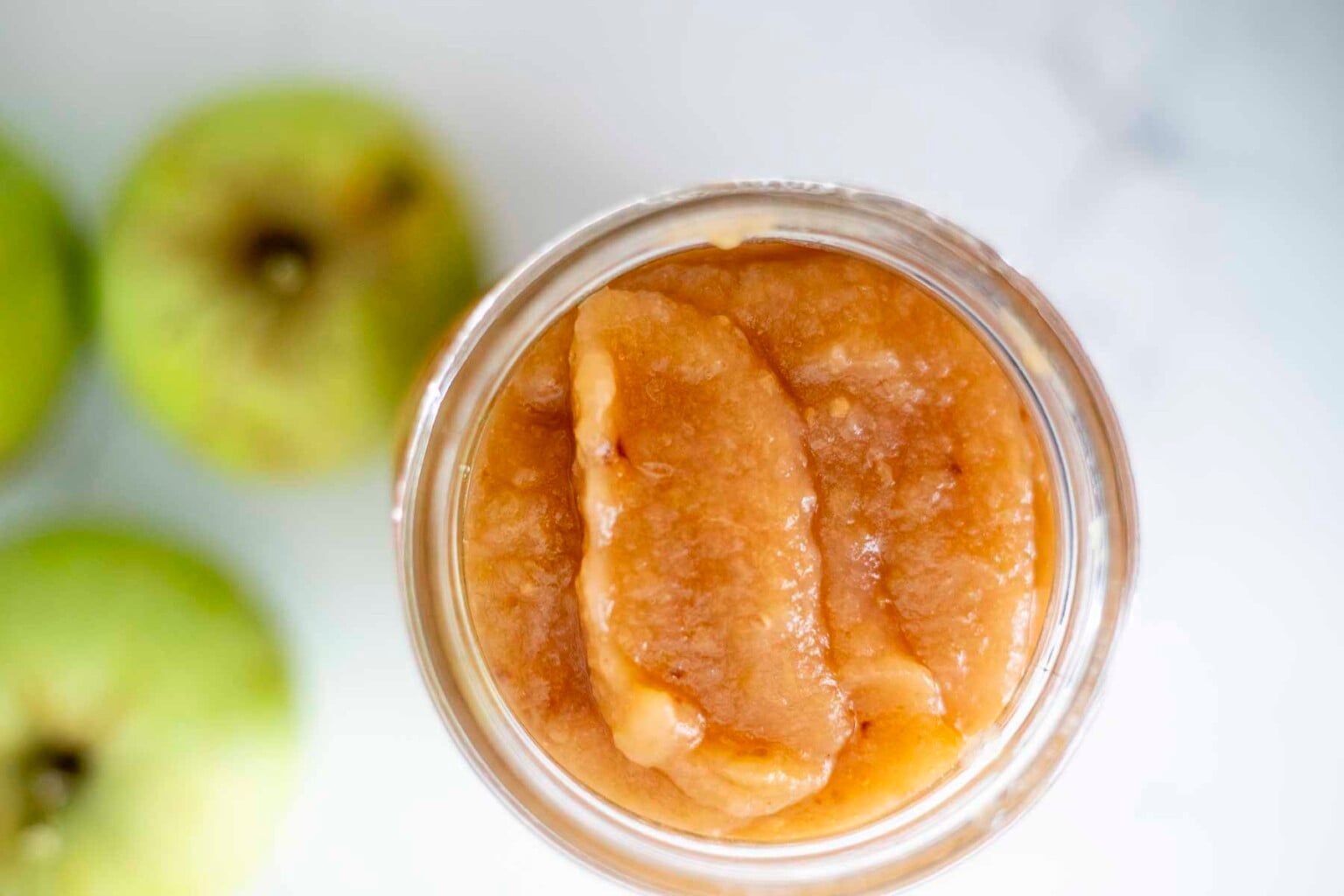 Applesauce in a mason jar.