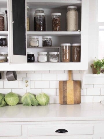 Farmhouse Kitchen Cabinet Organization with Mason Jars