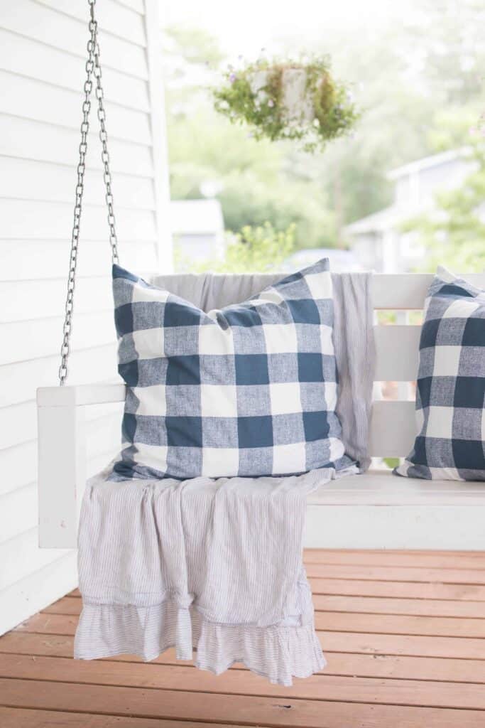 DIY pillows on a porch swing