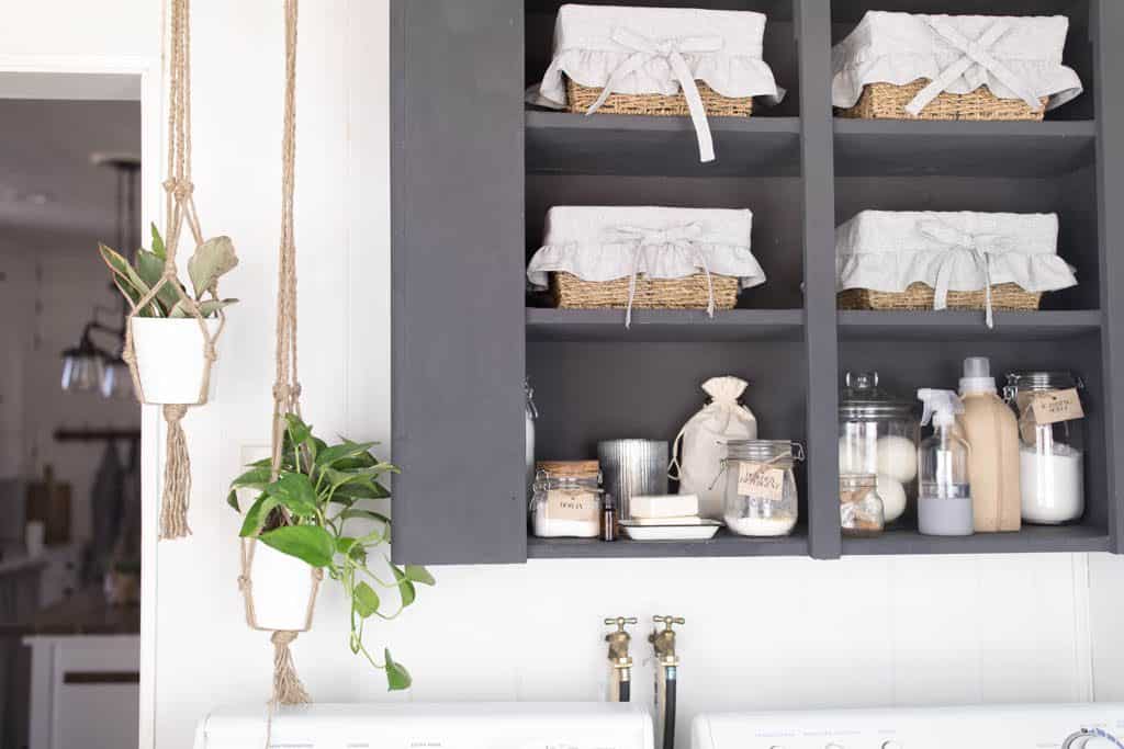 farmhouse laundry room organization cabinet makeover