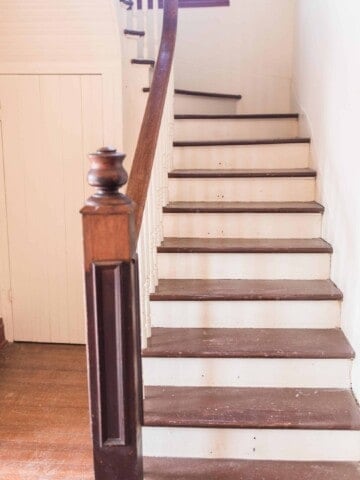 painted staircase in old victorian farmhouse