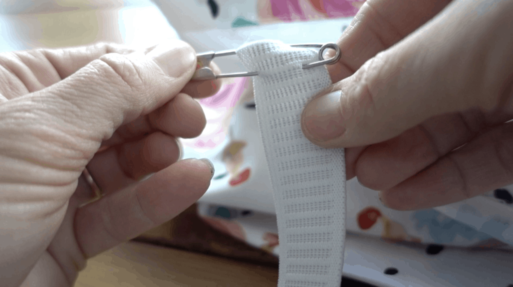 putting a pin in the elastic