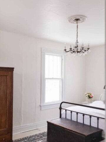 our new chandelier in our farmhouse master bedroom