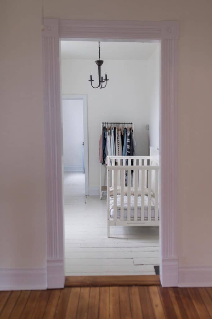 farmhouse nursery painted wood floors benajmin moore white dove paint 