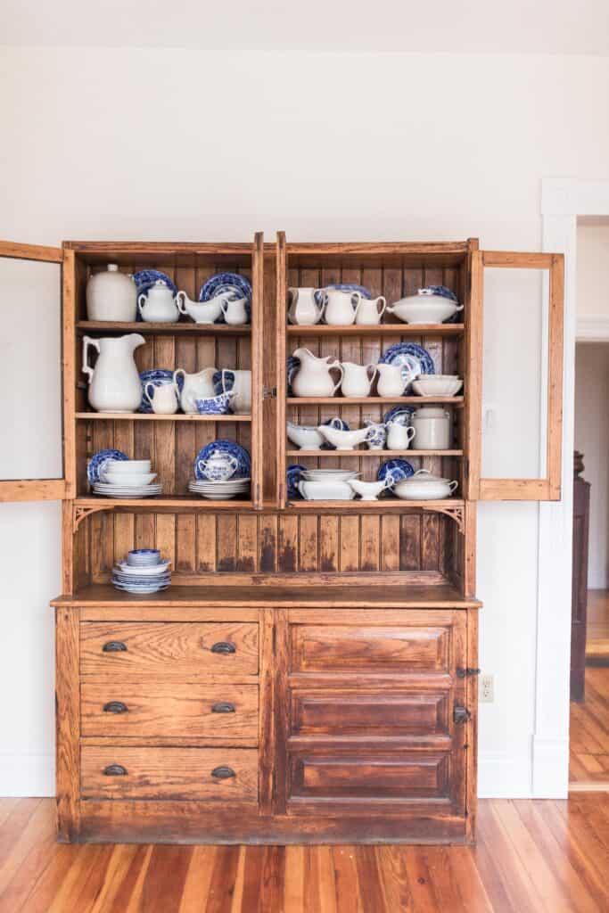 blue china and antique hutch