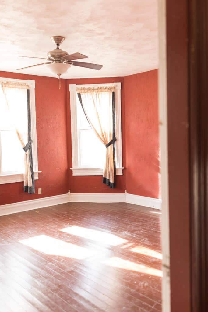 farmhouse room with red painted walls