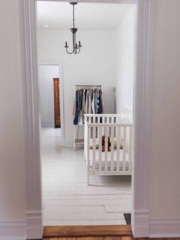 painted white hardwood floors in farmhouse nursery