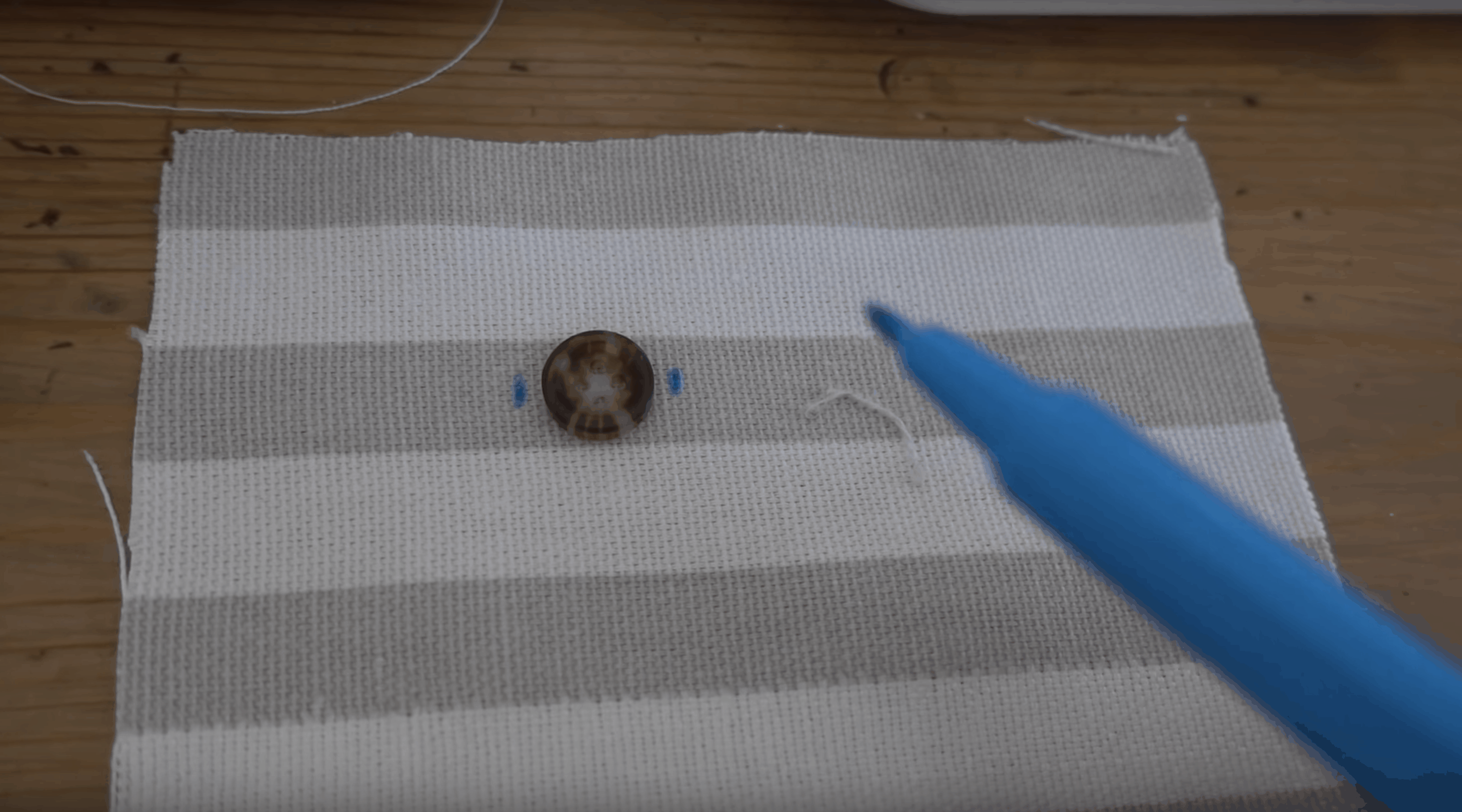 Marking the Button Hole with Two Small Dots - how to make a buttonhole