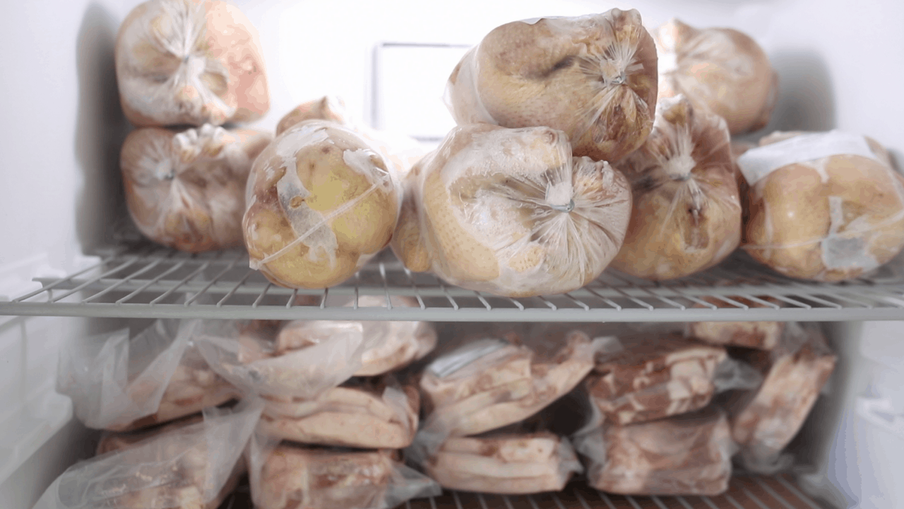 frozen organic chicken and pork in the freezer