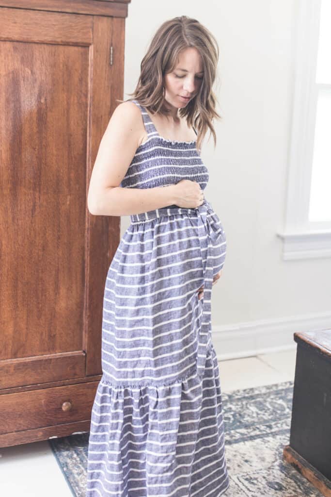 women wearing a blue and white stripped DIY shirred dress