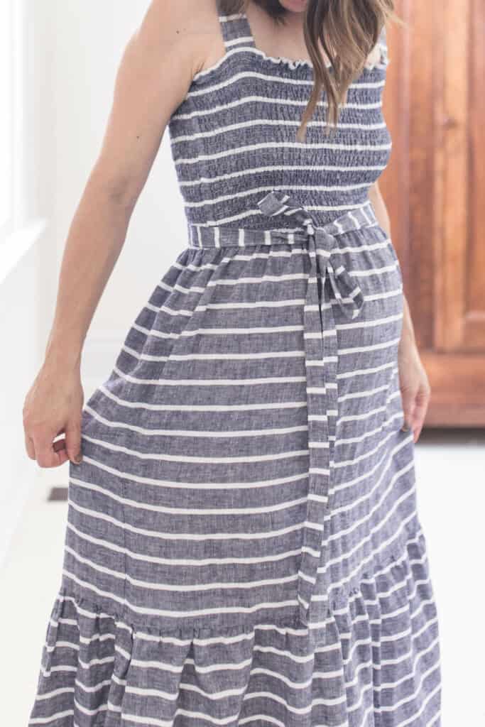 women wearing a white and blue stripped DIY shirred dress