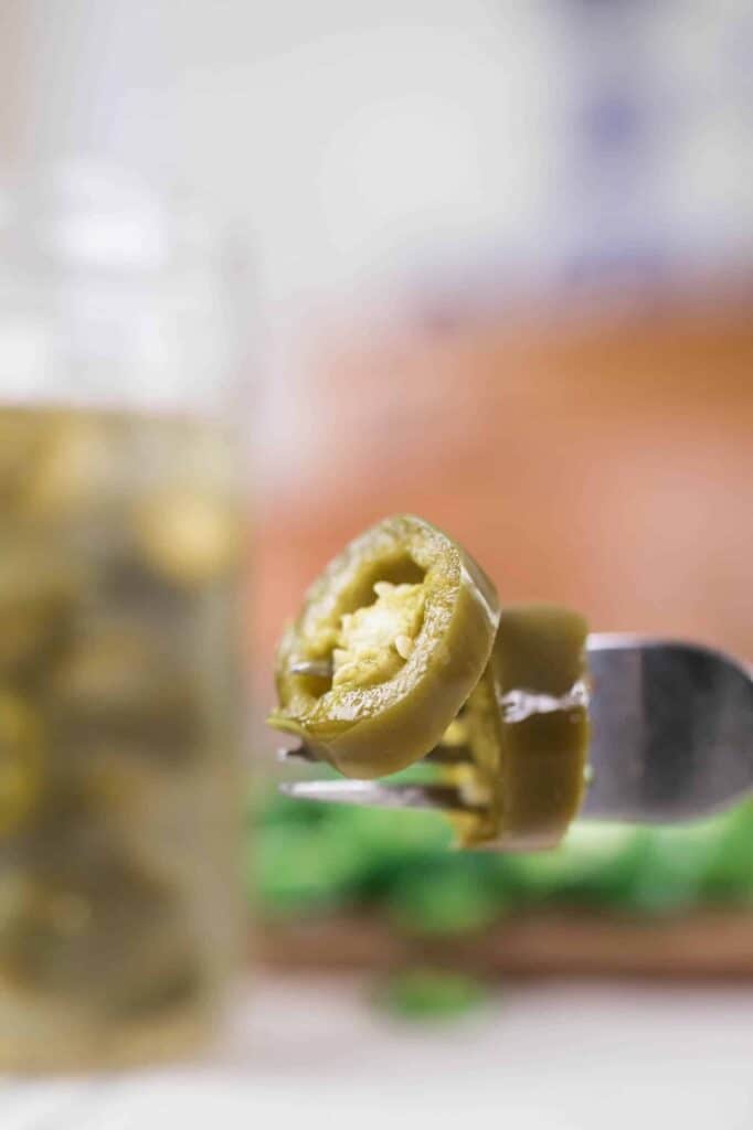 fermented jalapenos on a fork