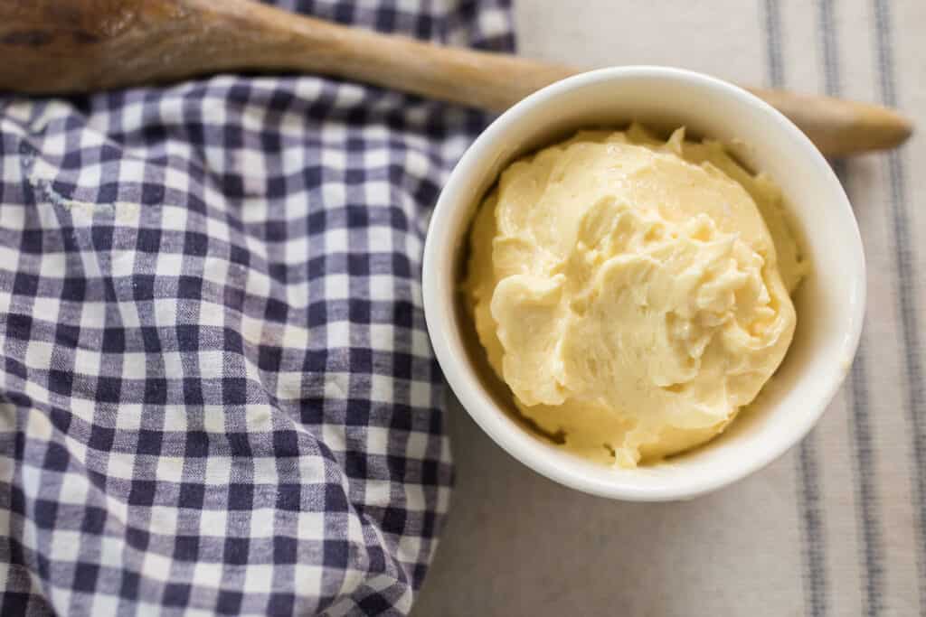 grass fed butter made at home in a white dish 