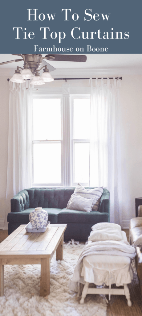 white tie top curtains in a living room with a leather couch, green loveseat and coffee table