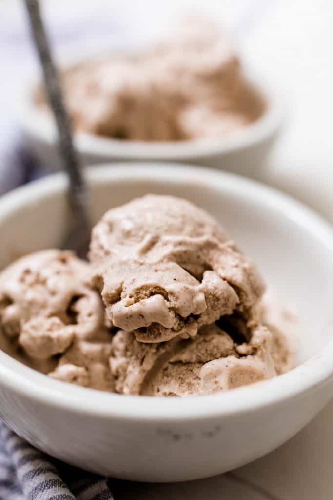 white bowl filled with paleo ice cream with a spoon