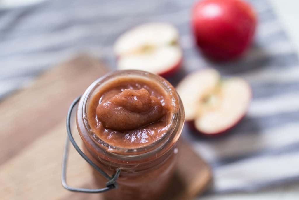 close up of apple butter in a mason jar