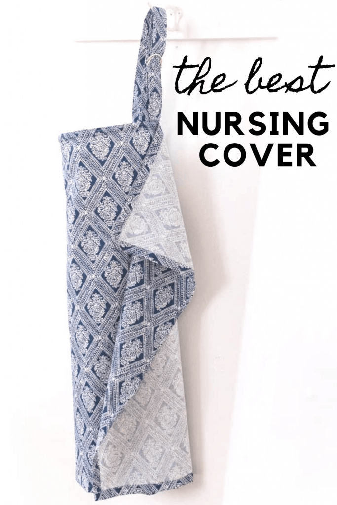 a blue and white nursing cover with wire handing up on a white hook