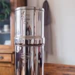 Berkey water filter on a wood farmhouse table
