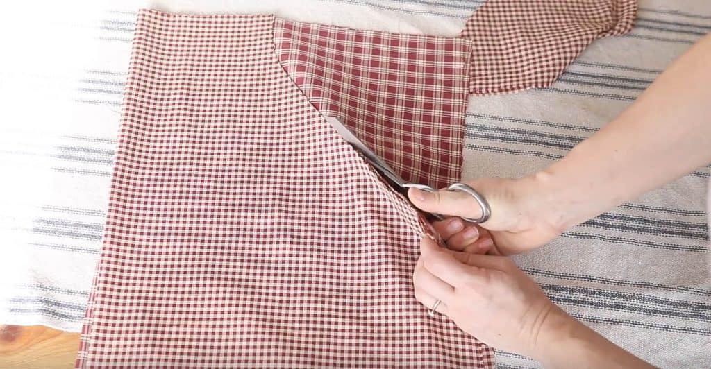 cutting arm holes For DIY reversible apron