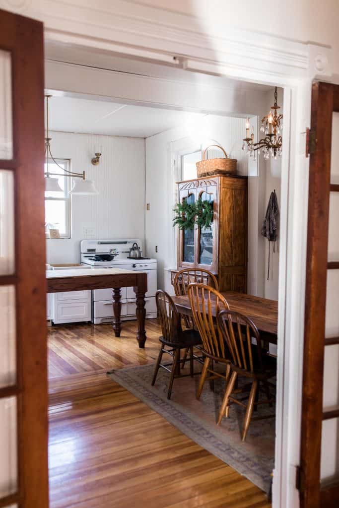 view from the entryway, through to the eat-in dinning room all the way through to the kitchen