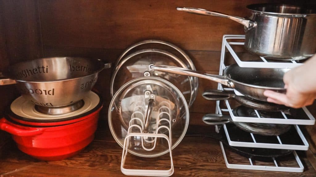 cabinet with dutch oven and kitchen organization solutions with lid holders and pan organizer