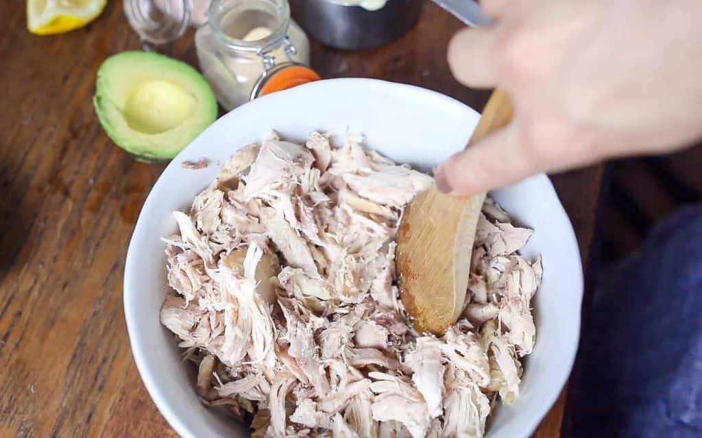 shredded chicken in a bowl to make southwest chicken salad
