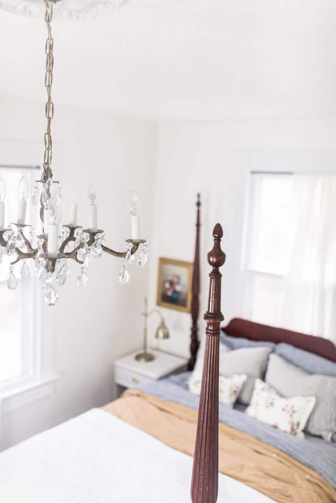 overhead shot of a victorian bedroom with a antique chandelier 