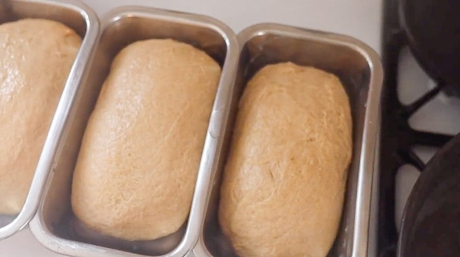 three loaves of whole wheat sourdough bread