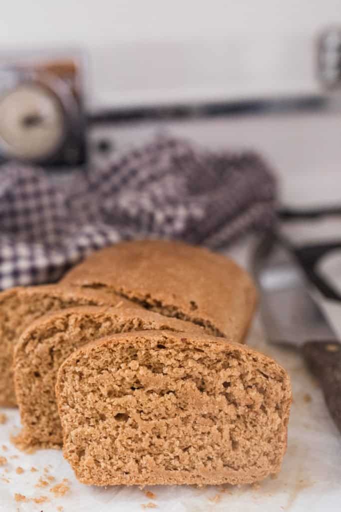 einkorn broaden a stovetop with a blue and white checked towel in the background