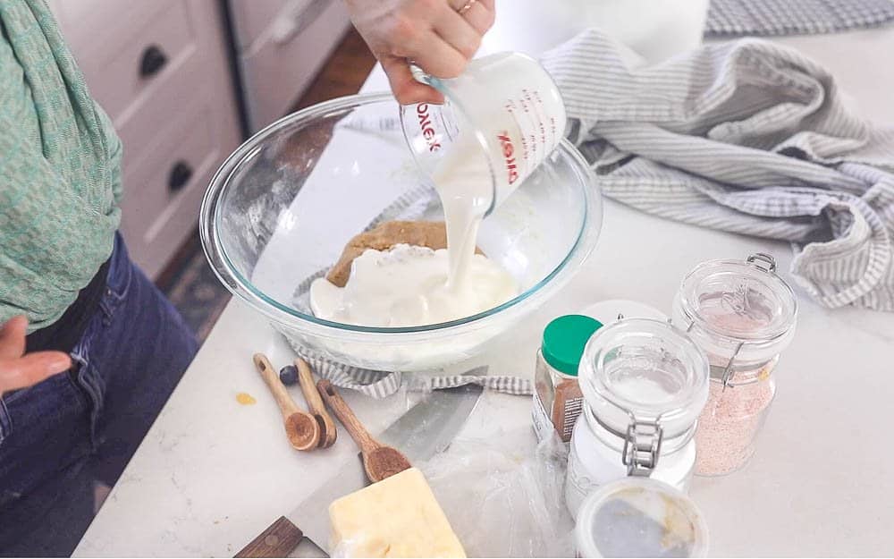 adding cream to sourdough cobbler topping