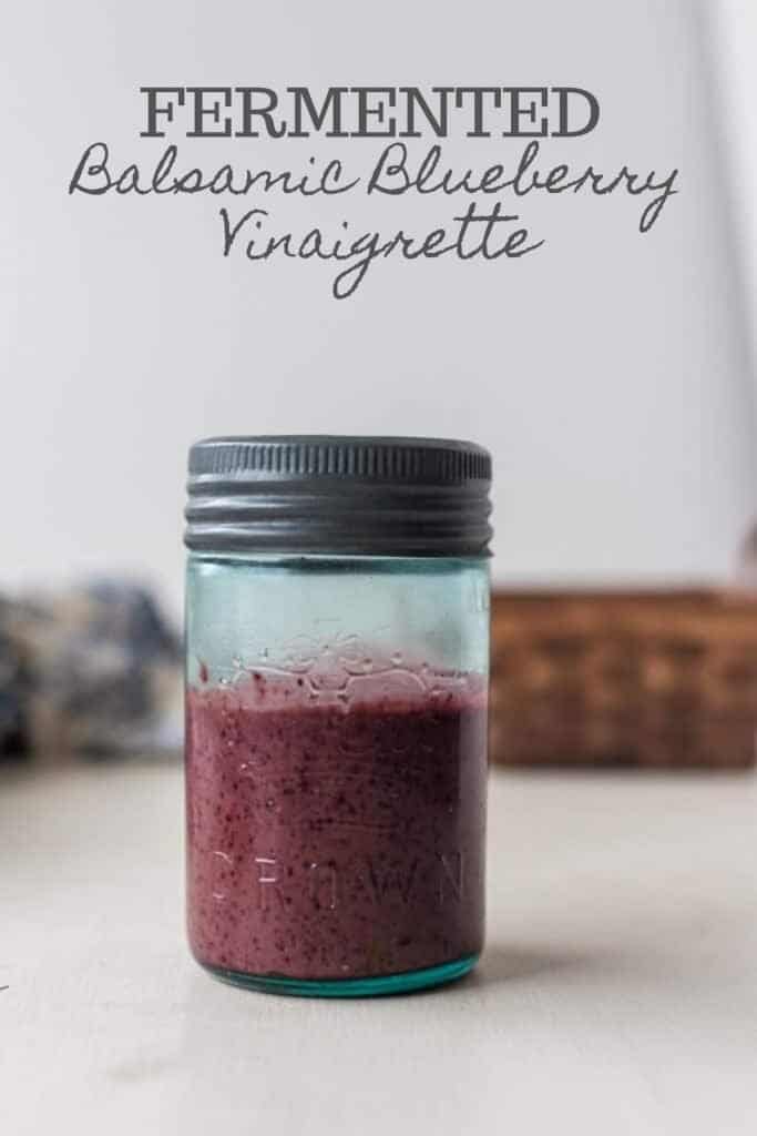 fermented balsamic blueberry vinaigrette in a glass jar with a metal lid