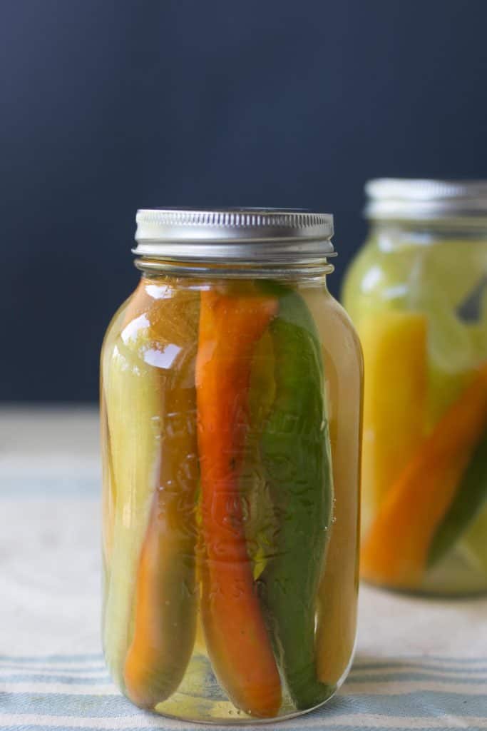 two jars of fermented peppers