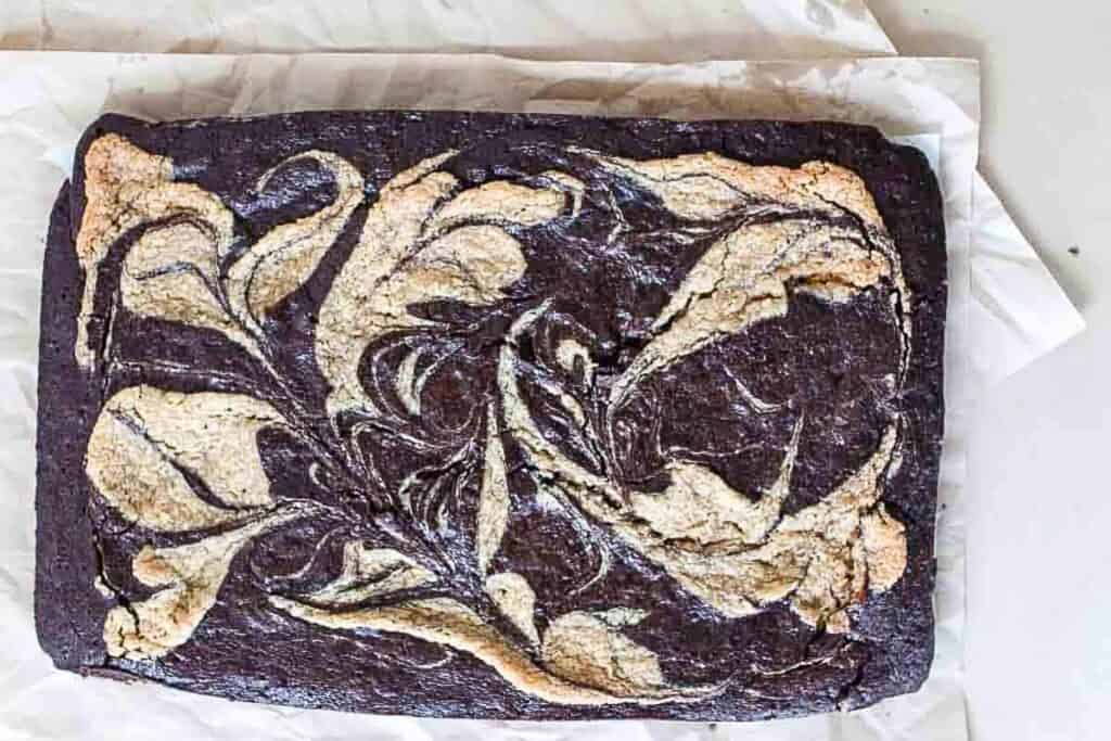 sourdough brownies with a tahini swirl in a baking dish