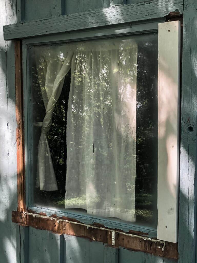 old cottage window trim being removed to install new exterior trim