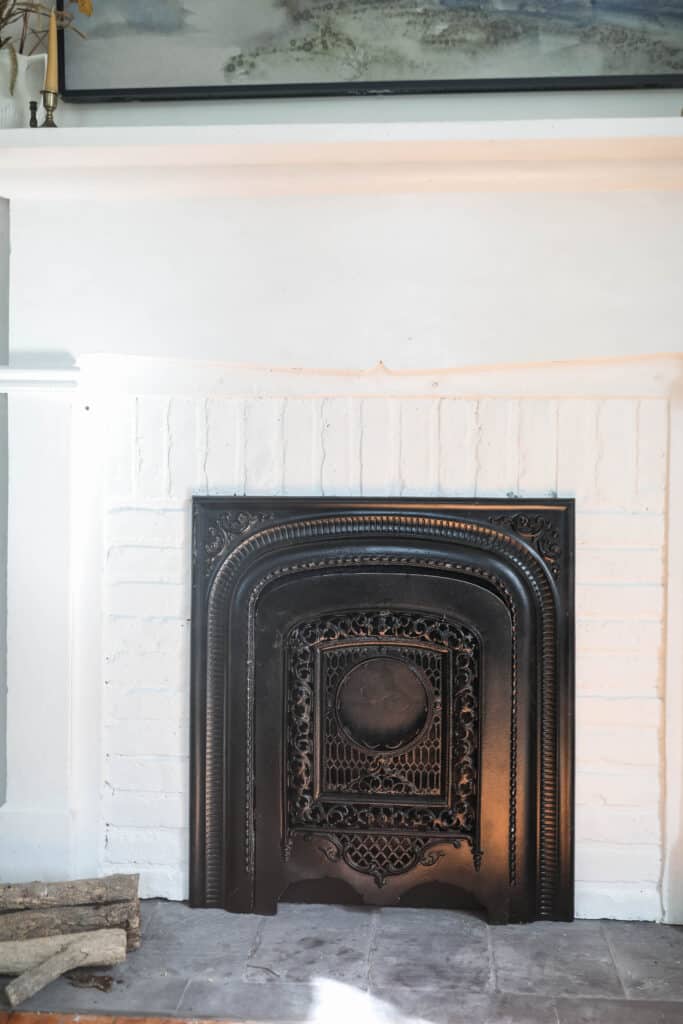 close up of a DIY faux fireplace with mantle