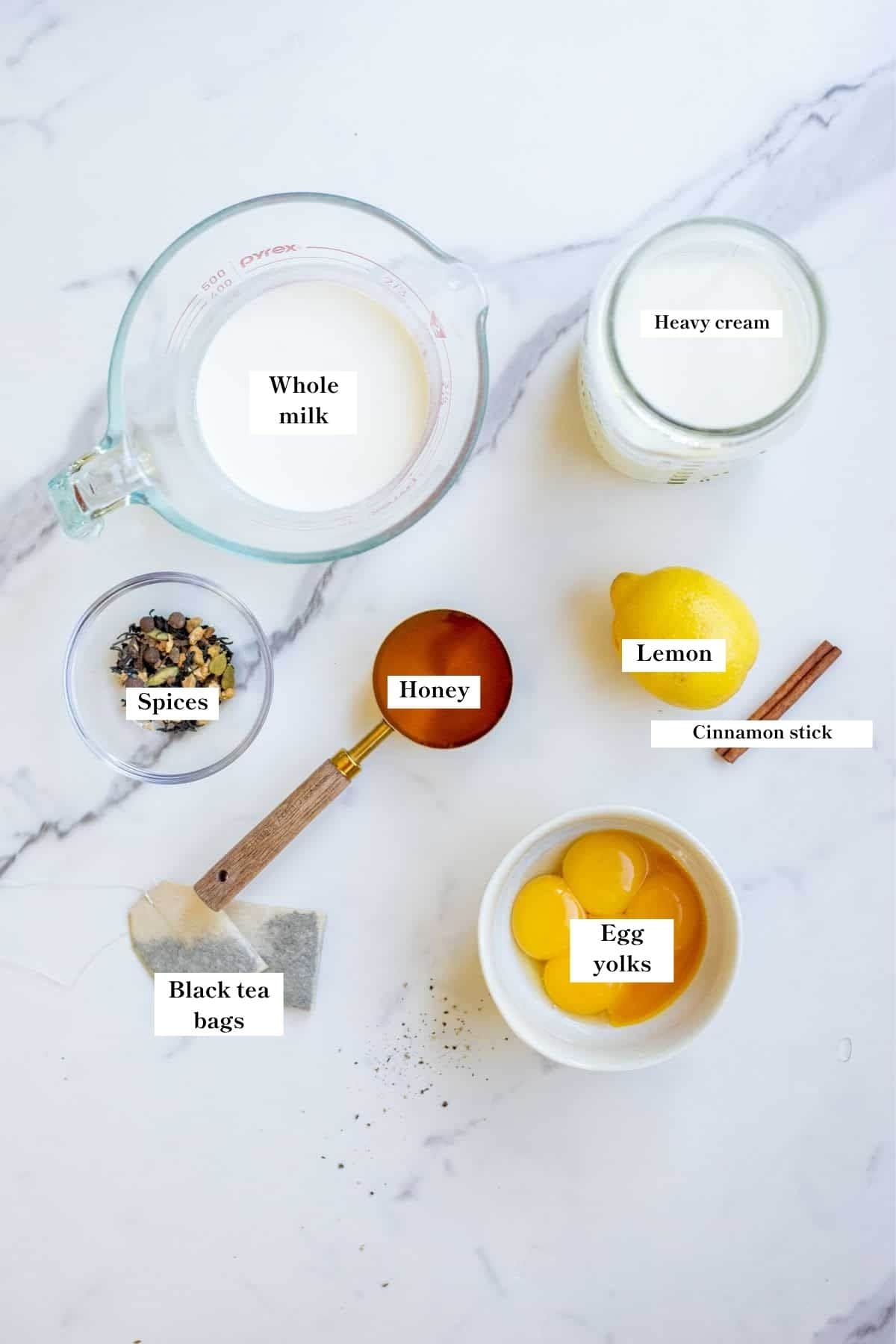 Ingredients on a white marble counter top.