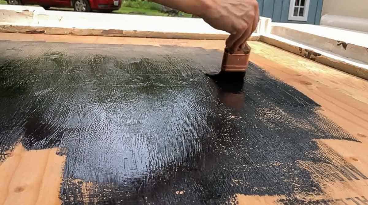 painting plywood black attached to a fireplace mantle