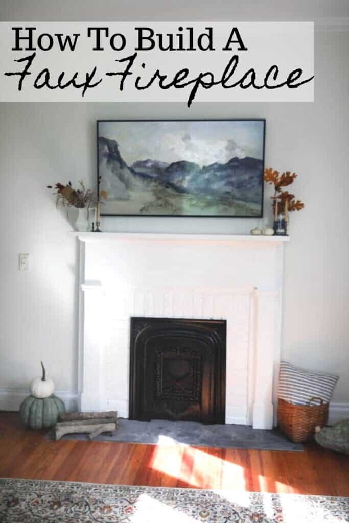 DIY faux fireplace with a vintage mantle and summer cover. A frame Tv sits above the fireplace