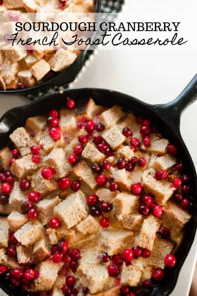 two cast iron skillets with cranberry French toast casserole made with sourdough bread