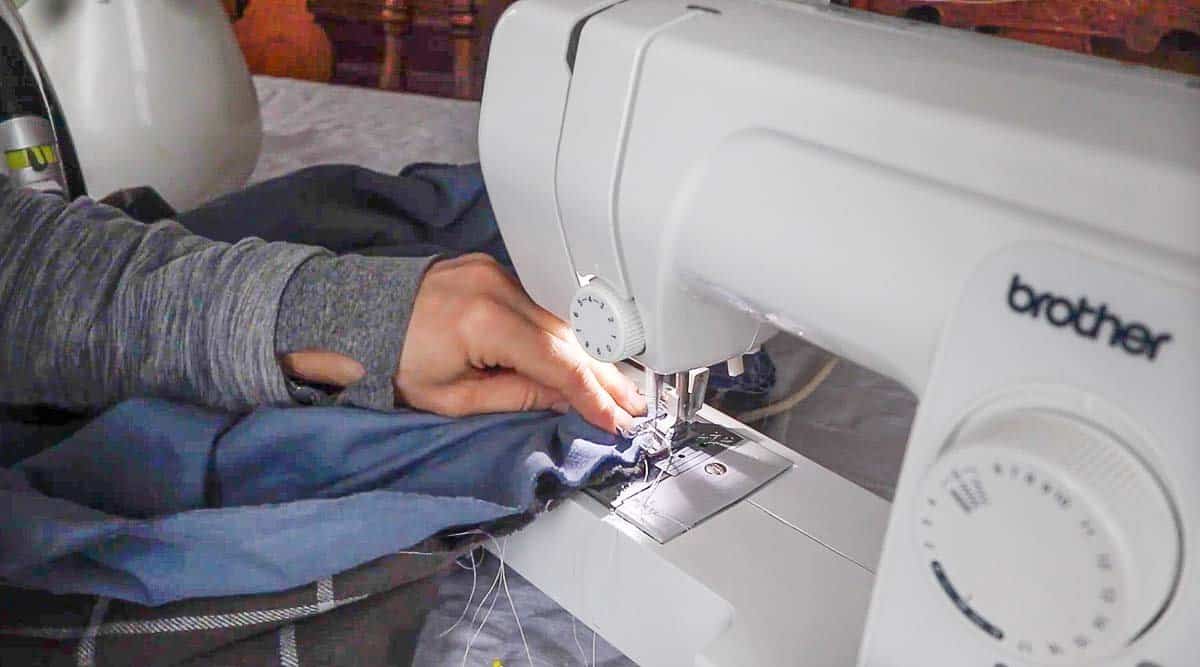 sewing a DIY flannel blanket together