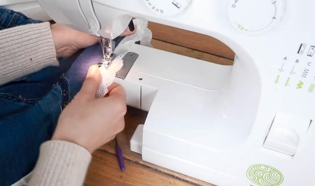 top stitching eyelet trim onto a jean skirt