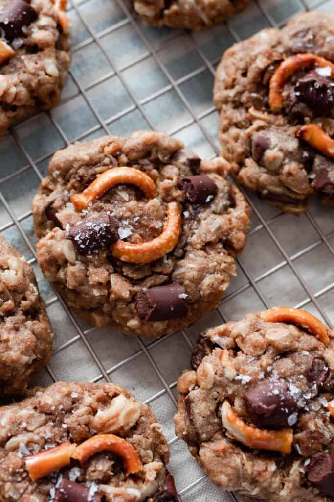 close up of oatmeal lactation cookies on a cooling rack.