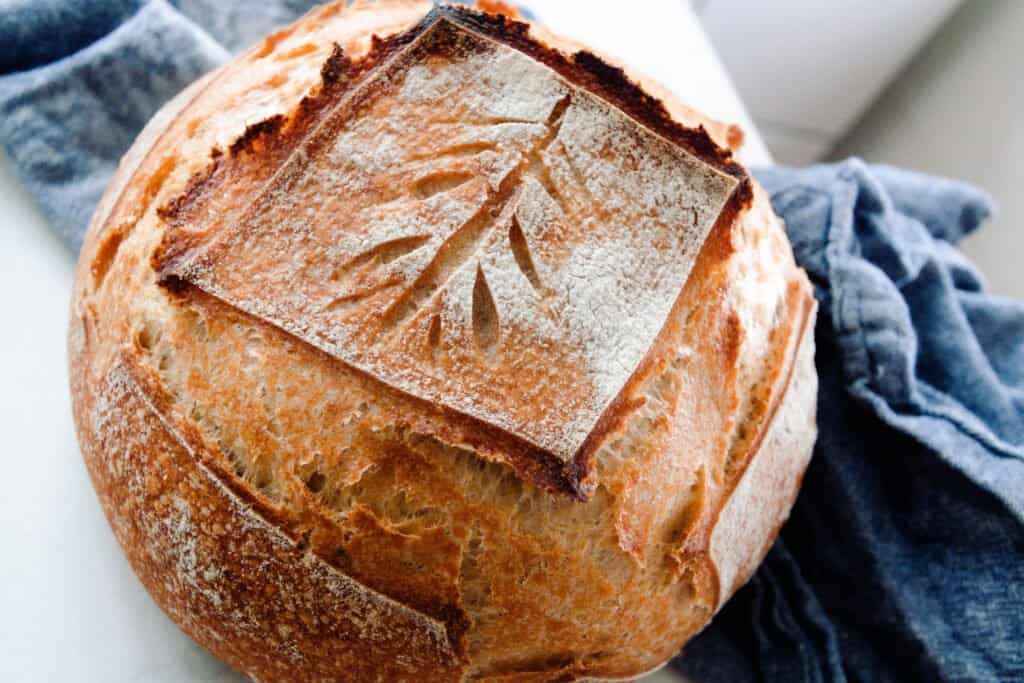 loaf of bread on a white countertop