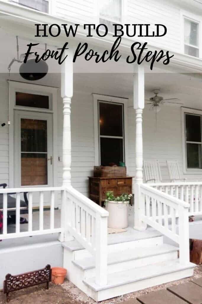 White Victorian front porch with wooden steps painted white and gray